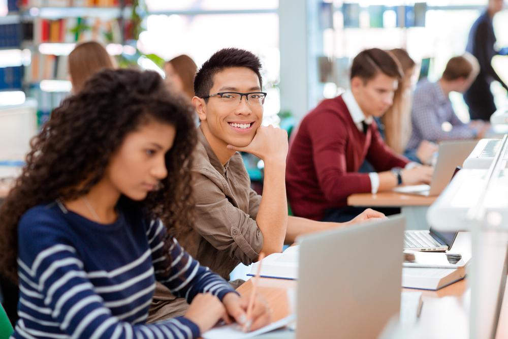 Group of a students studying in the university library